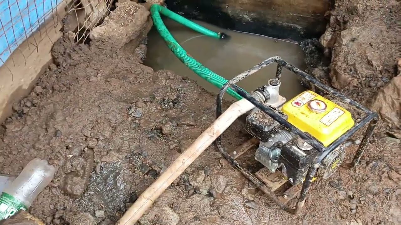 Pumping water from hole using Daichi Japan pump 