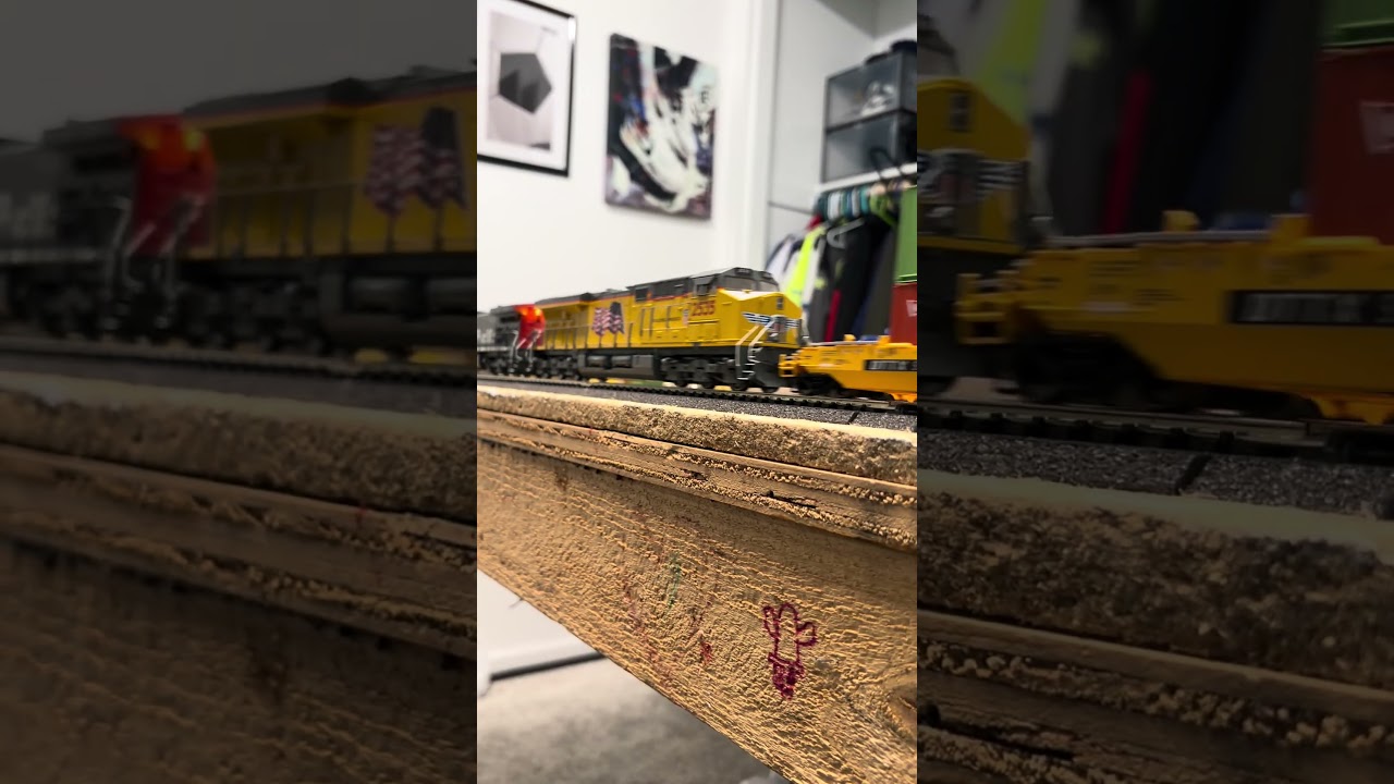 SP 192 ac4400 leads up freight train on the layout Ho scale