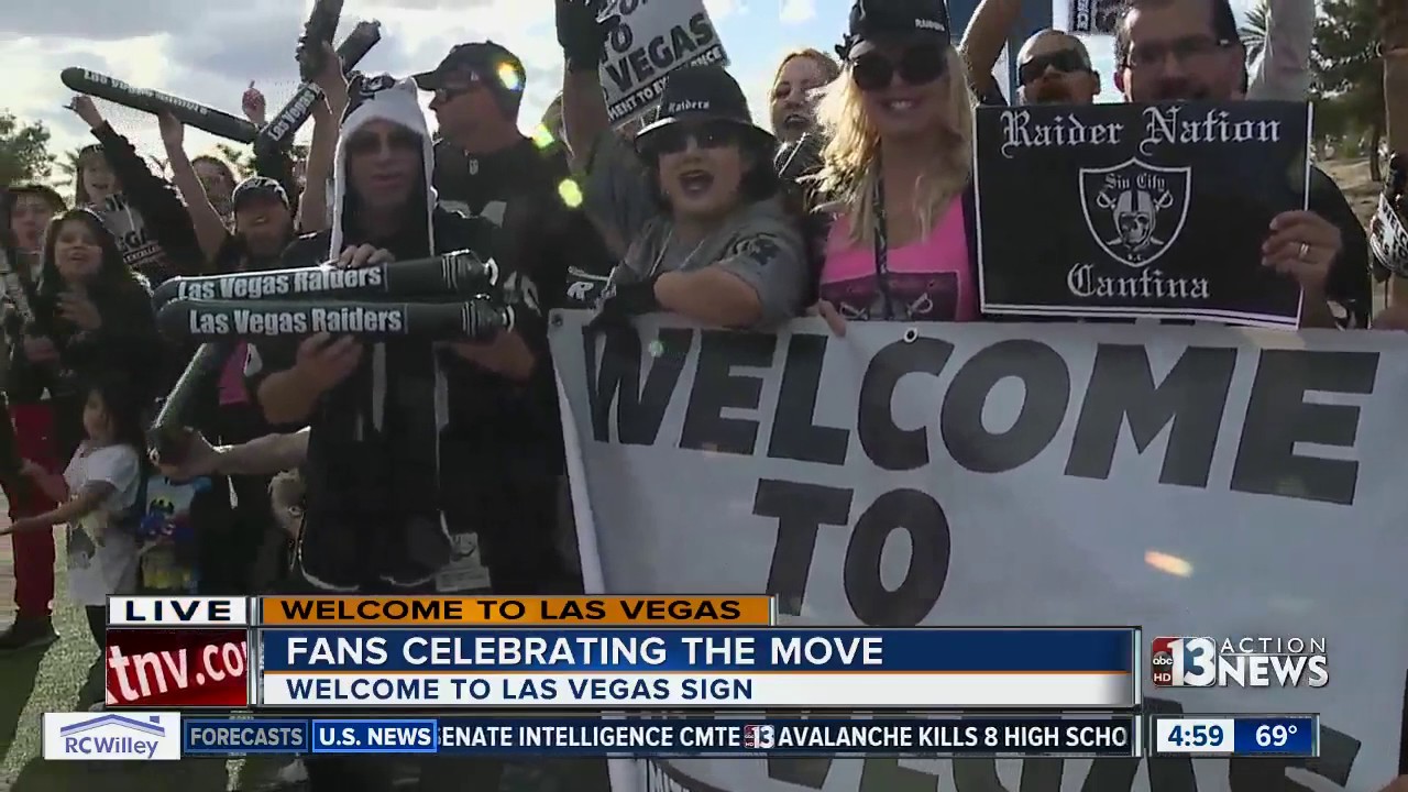 Fans celebrate Raiders move at Welcome to Fabulous Las Vegas sign