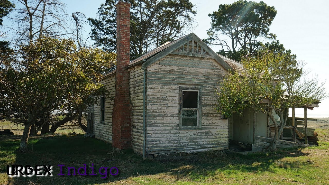 Abandoned- Lonely old farm house built early 1900's still standing proudly deep in the fields.