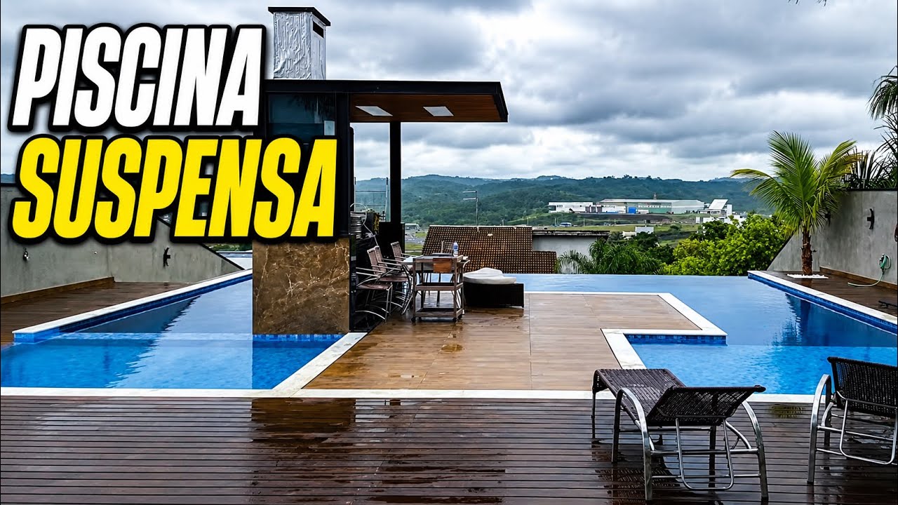 Piscina borda infinita com bar molhado e suspensa - Terreno declive