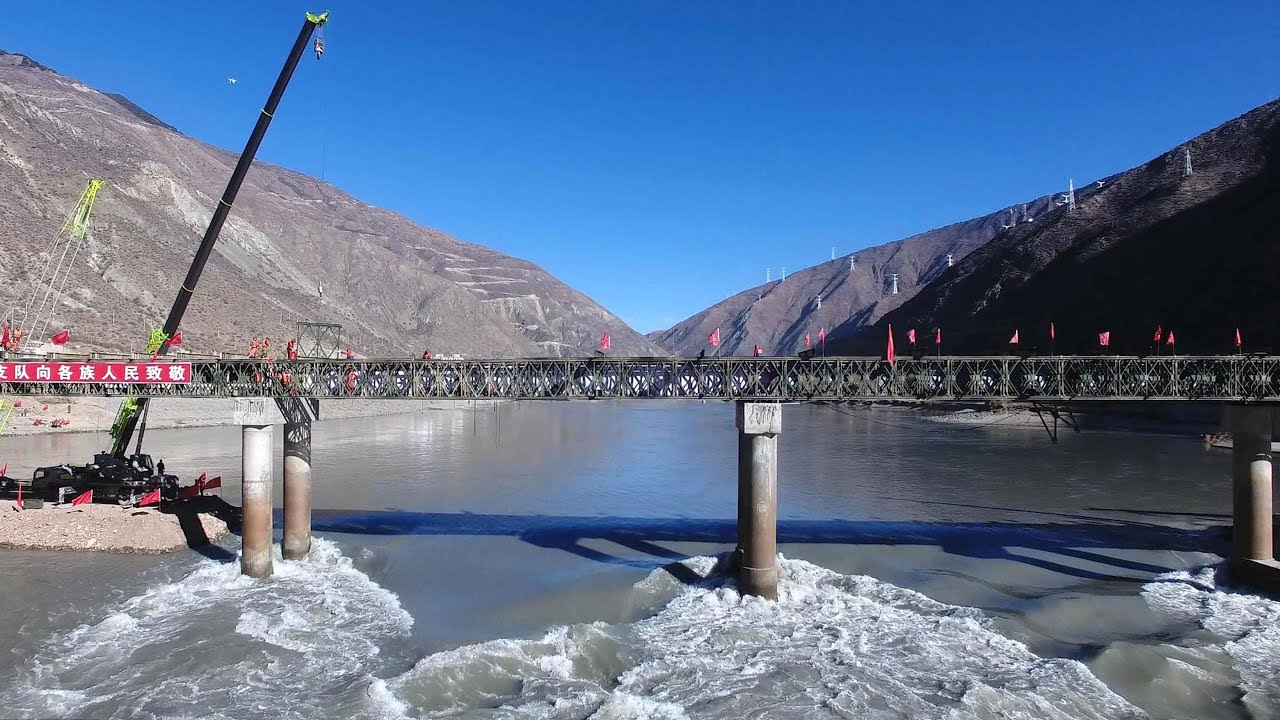 Steel framed bridge over Jinsha River open to traffic in SW China
