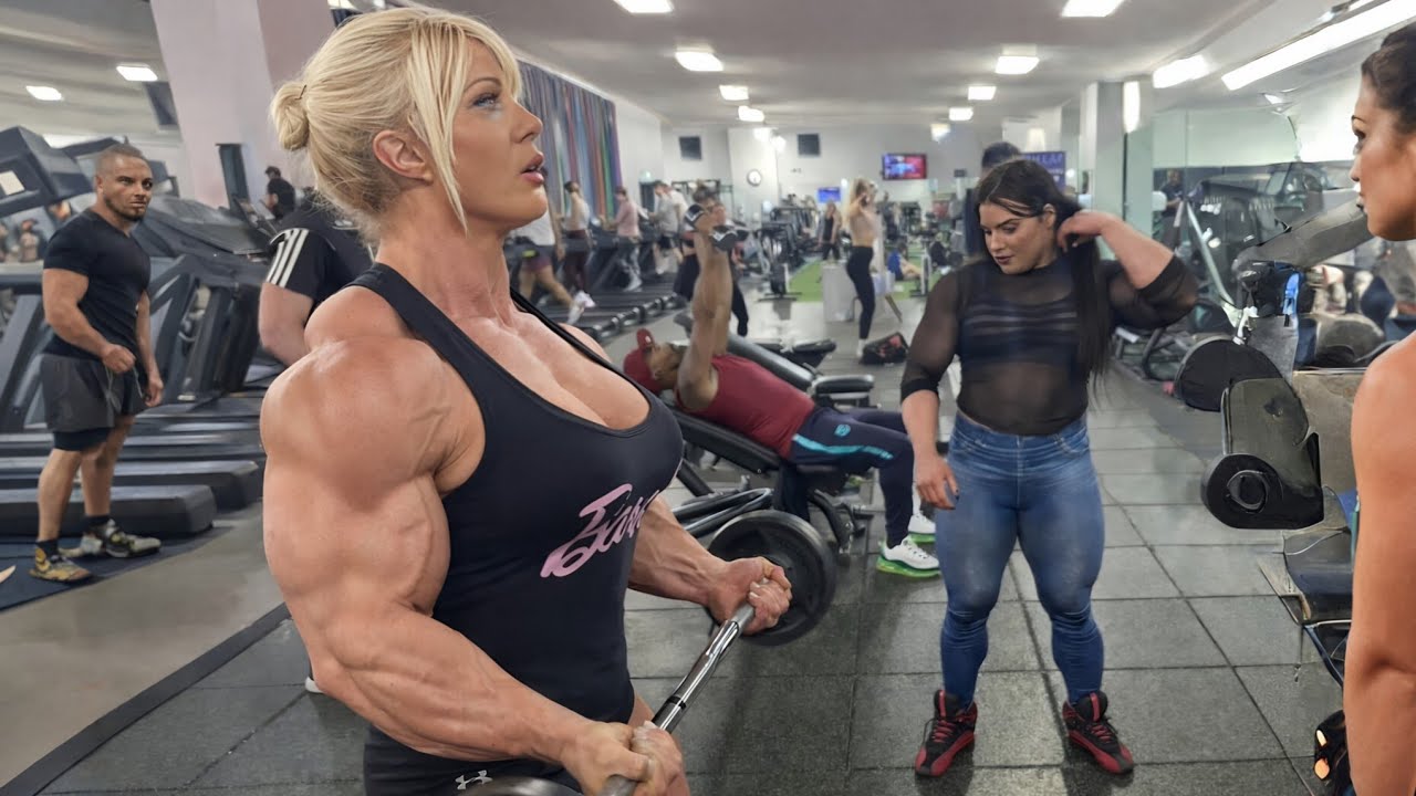 IFBB Pro Lisa Cross Big Biceps Strong Muscle Woman bodybuilder