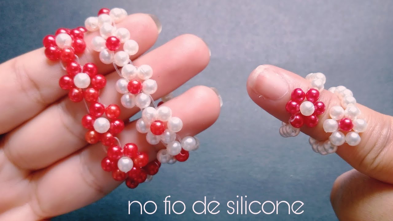 Pulseira de pérolas no fio de silicone/passo a passo.