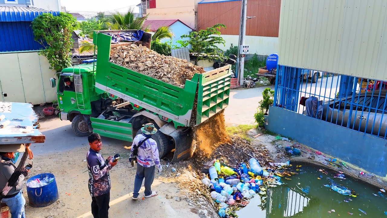 amazing work landfill building house project ,truck transport with bulldozer push soil to land
