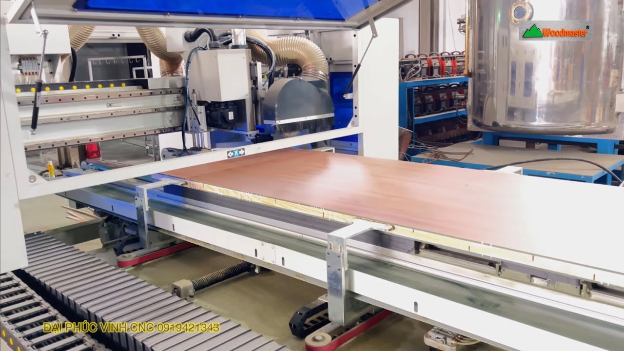 Máy cắt 4 cạnh cánh cửa tự động Woodmaster | Dây chuyền máy Sx cánh cửa 