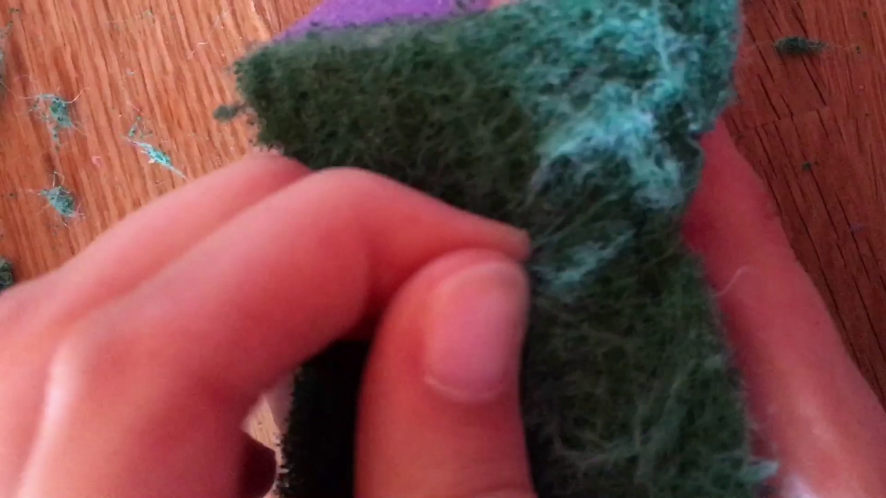 ASMR ripping scourer off a sponge