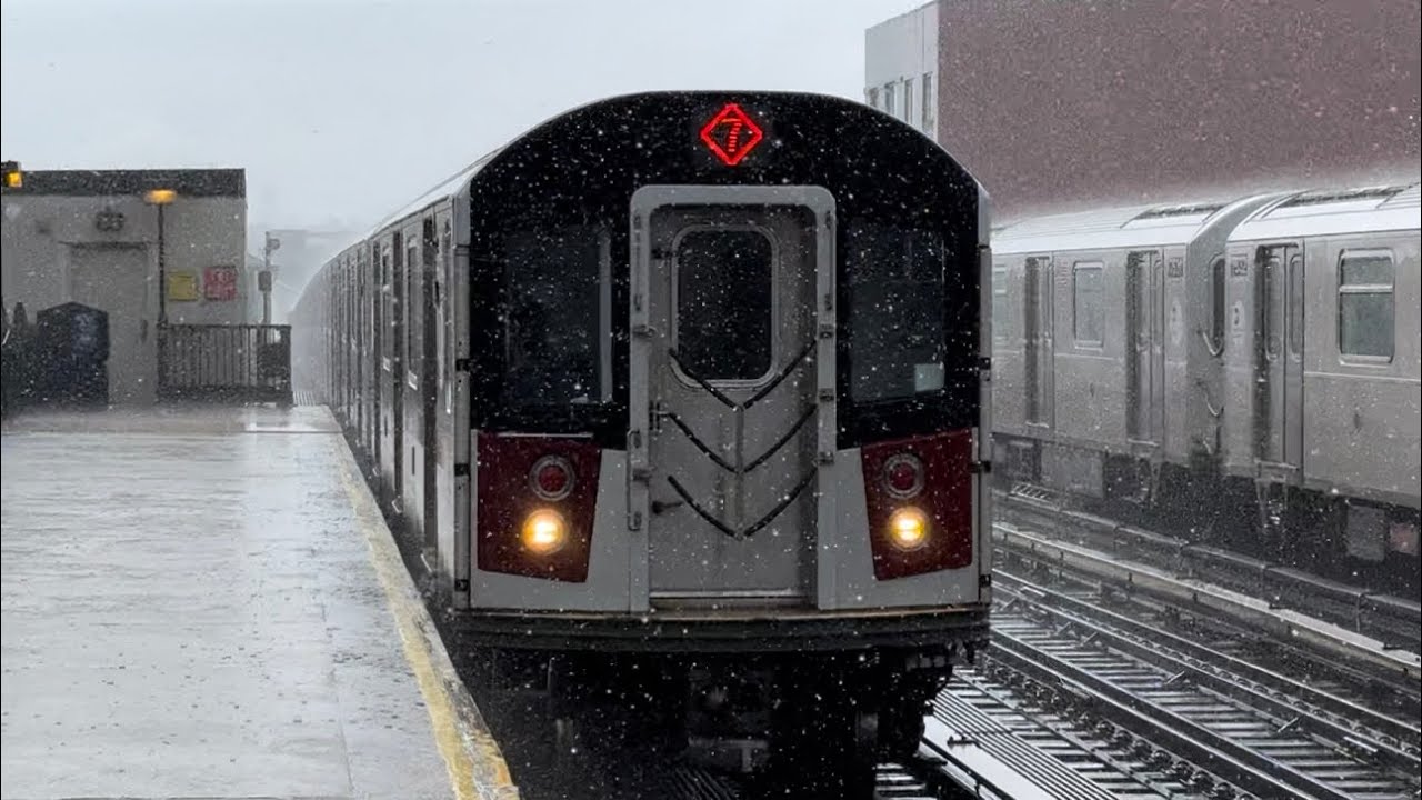 R188 7/7X Trains at 69 Street in a Rainstorm