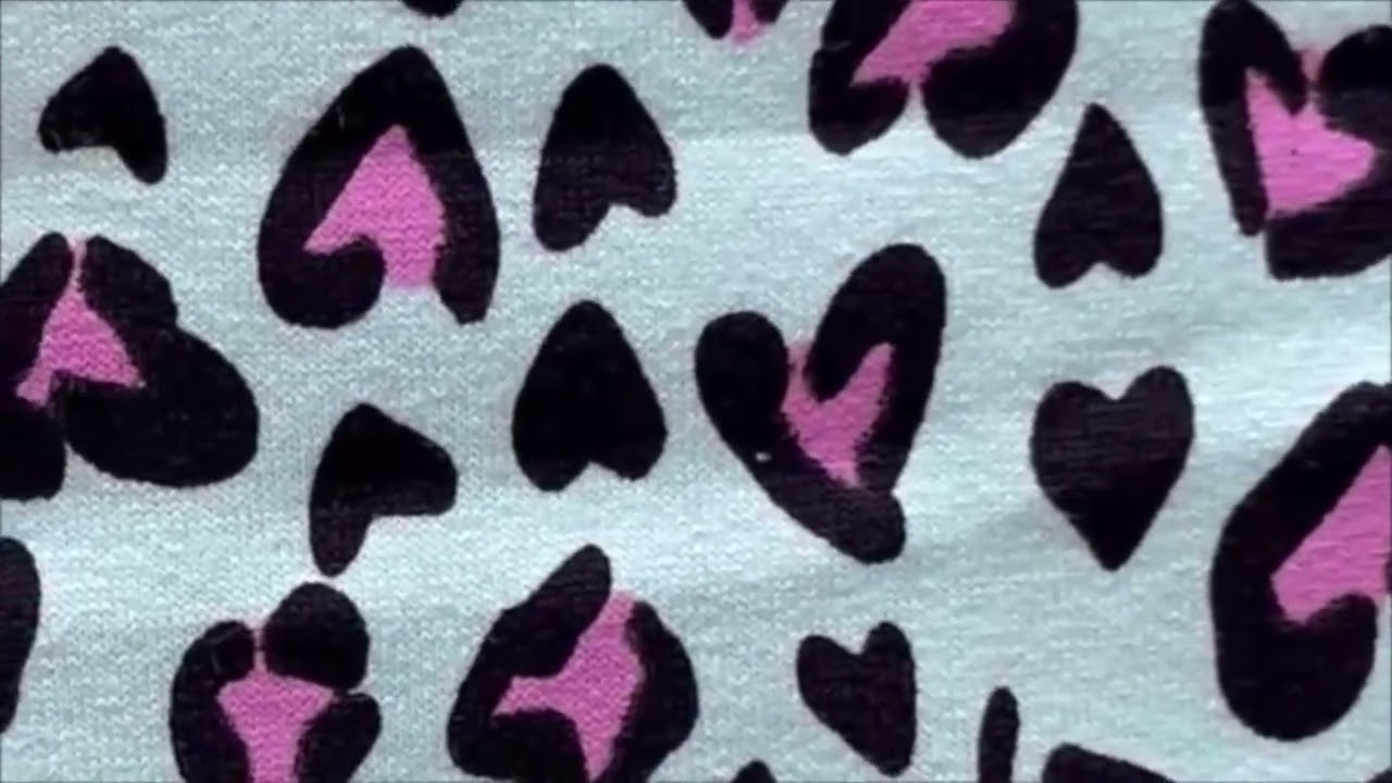 Tela de algodón con lycra cardado estampada verde agua animal print rosa