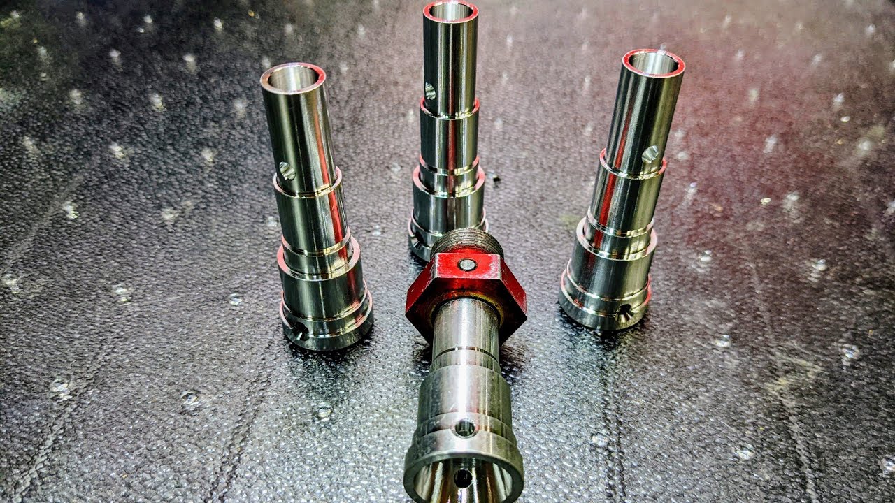 NEW!! M2C 15mm Extended axles with 24mm wheel Hexes for the Xmaxx. M2C Custom Delrin Pistons.
