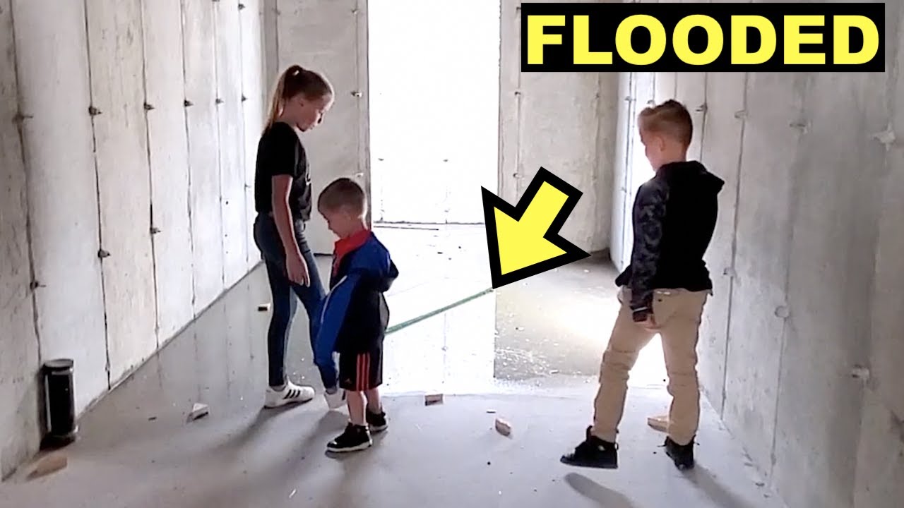 RAIN FLOODED our BASEMENT in our NEW HOUSE!!