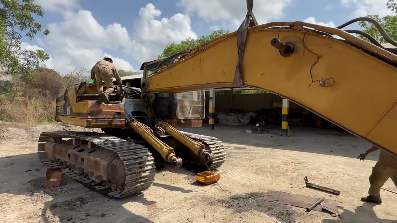 The process of repairing and removing the elliptical hole on the boom of a Cater 325b excavator
