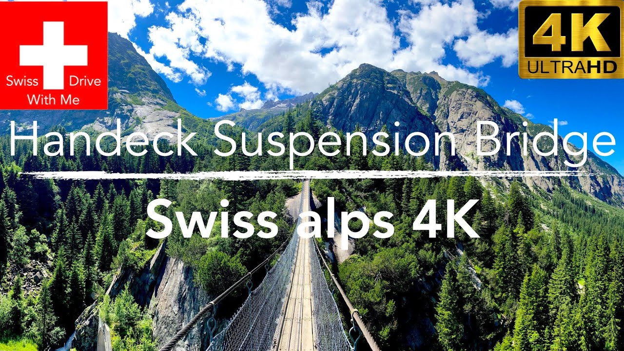 Switzerland suspension bridge with a waterfall view in 4k
