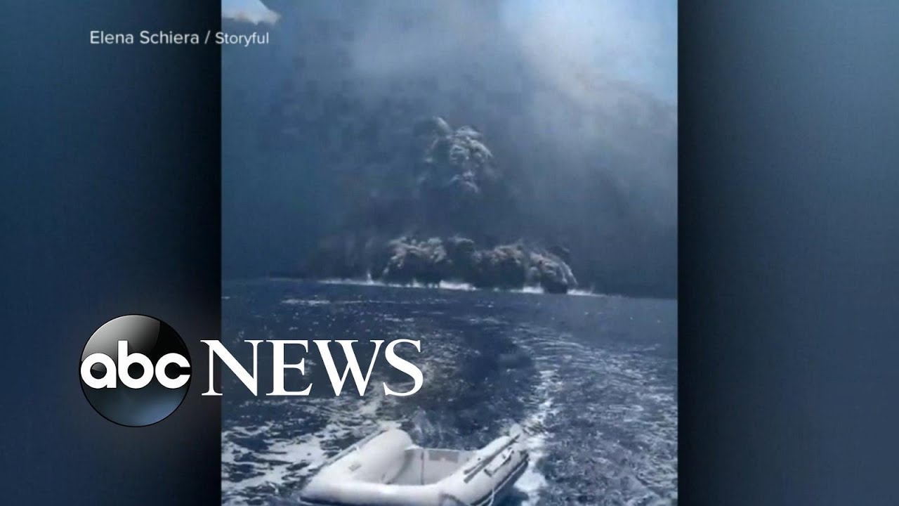 Island volcano of Stromboli erupts right in front of tour boat
