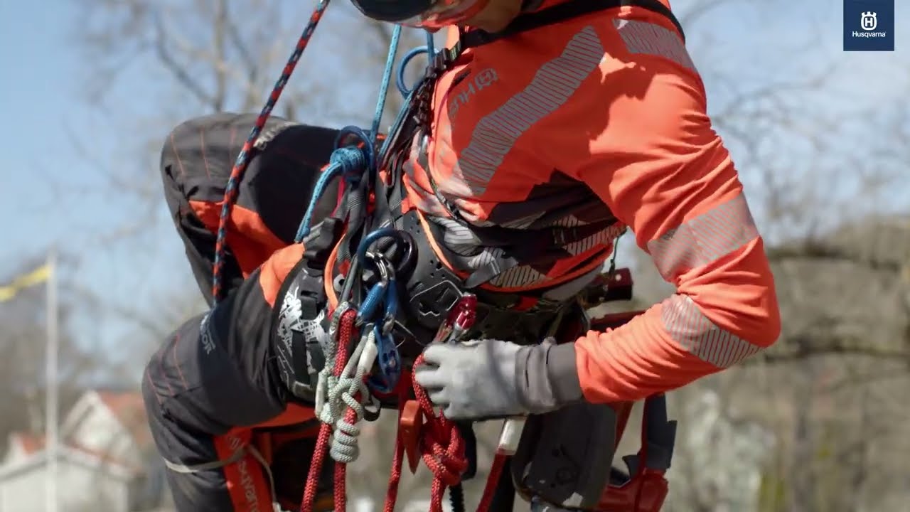Husqvarna climbing harness in action