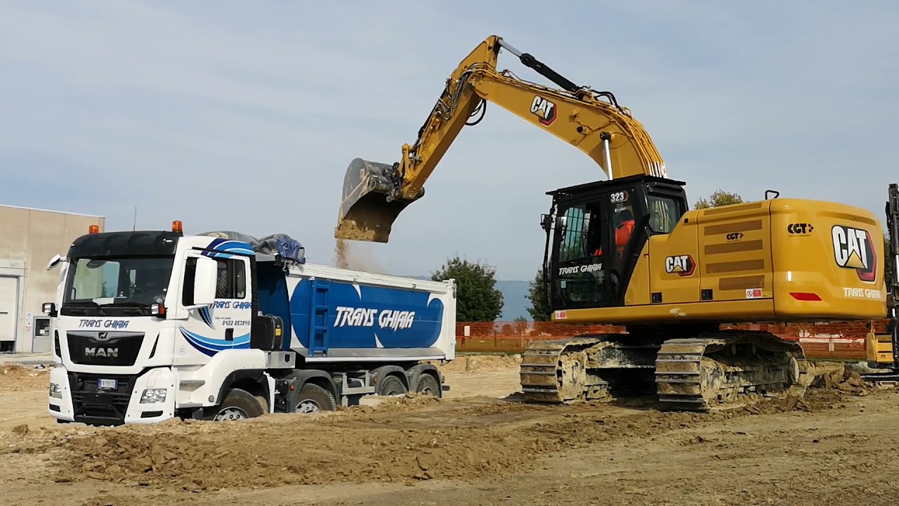 NEW EXCAVATOR CATERPILLAR 323 NEXT GENERACTION LOAD TRUCK MAN BY TRANS GHIAIA GRAVEL ESCAVATORE CAT