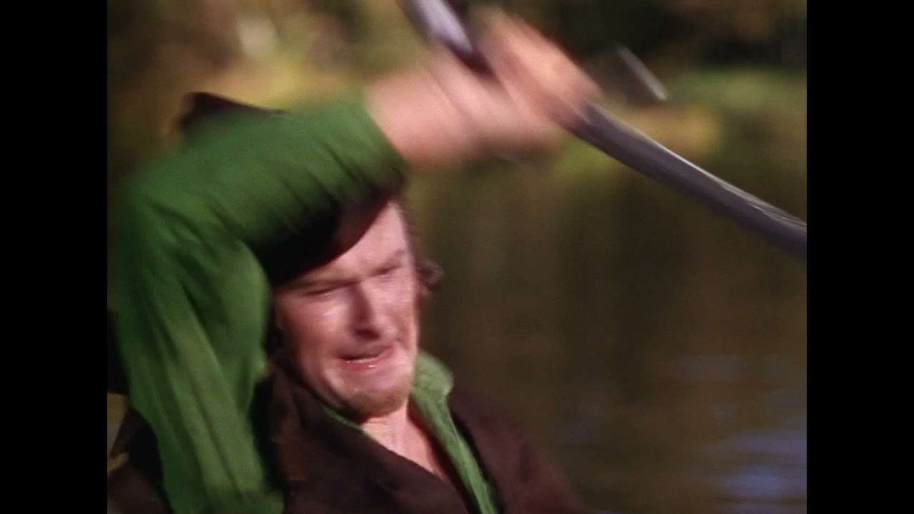Friar Tuck fights with Robin Hood The Adventures of Robin Hood 1938