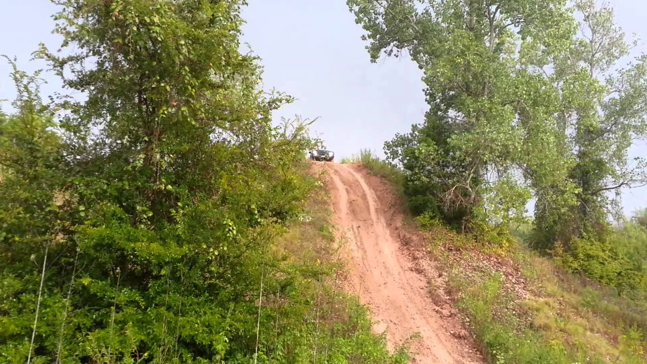 Toyota Land Cruiser sliding down muddy hill at BVORR at Tx4wd State Meet. Brakes fully locked up!