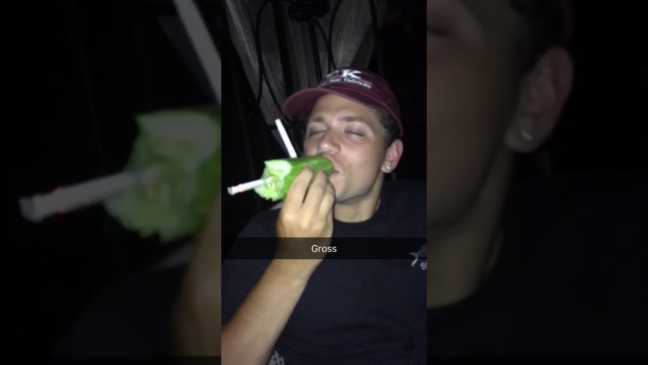 Ethan smoking 2 cigarettes out of a cucumber