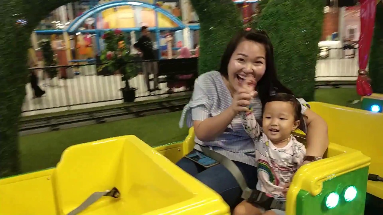 Play indoor playground with the wheels on the bus song