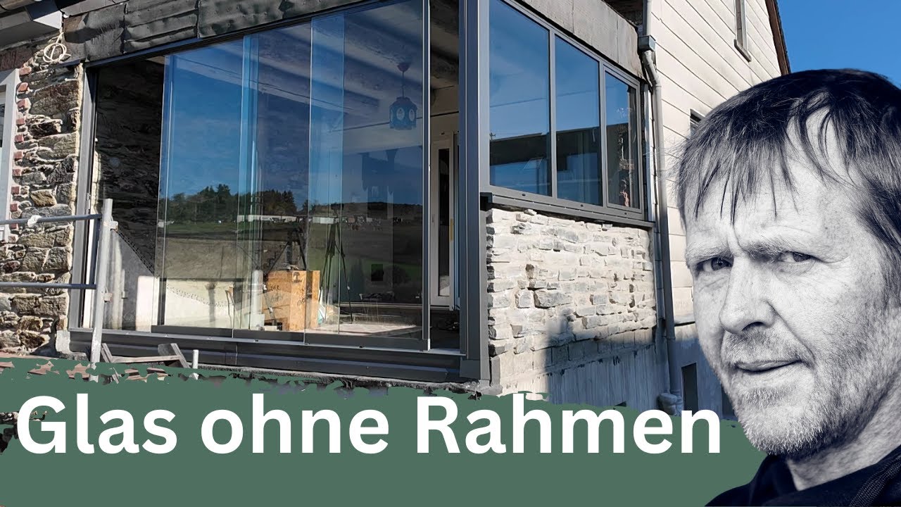Holzterrasse ersetzt durch rahmenlose Glasfront &ndash; Schiefermauer & Schiebet&uuml;ren im Altbau