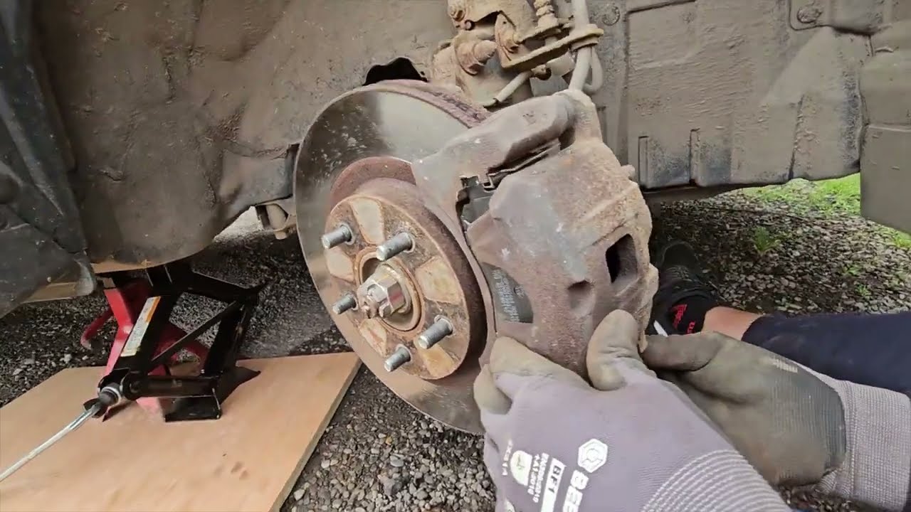 how to change front brake pads on Mitsubishi asx