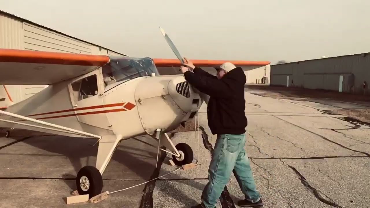 Jim Skadal Hand Propping His 1946 Taylorcraft BC12-D (N95909)