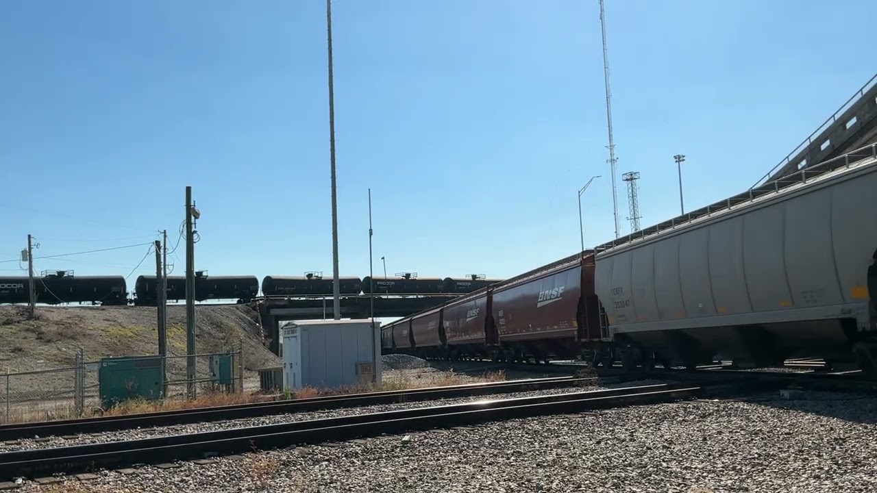 Bnsf 7235 leads a grain train with a beautiful K5HL and slams the diamond in Houston Texas!!!