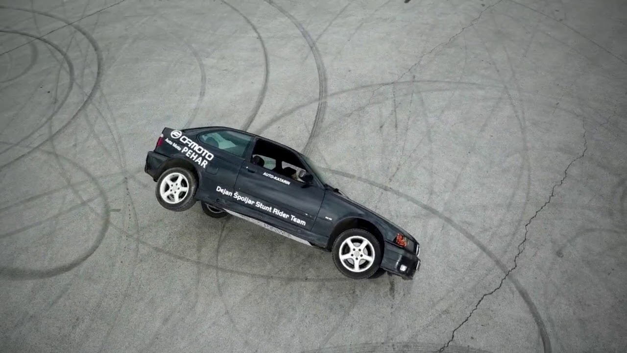 Stunt Driving on Two Wheels By Dejan &Scaron;poljar Stunt Driver (BMW E36compact)