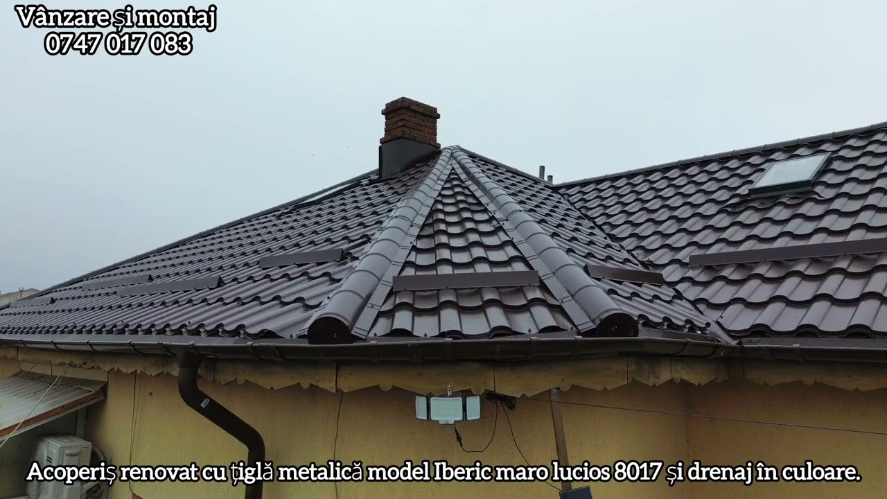 Acoperiș renovat cu model de țiglă metalică IBERIC maro lucios 8017 sistem de drenaj și luminatoare 