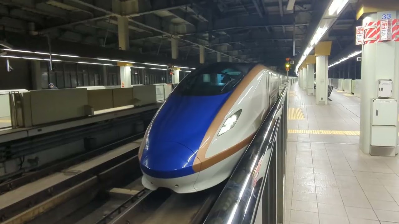 2026年2月15日北陸新幹線金沢(駅)W7系W編成運行·(各)停車中→発車 12番のりばW6編成(回送列車)回送2295E 13番のりばW1編成573Eはくたか573号→(回送列車)回送573E