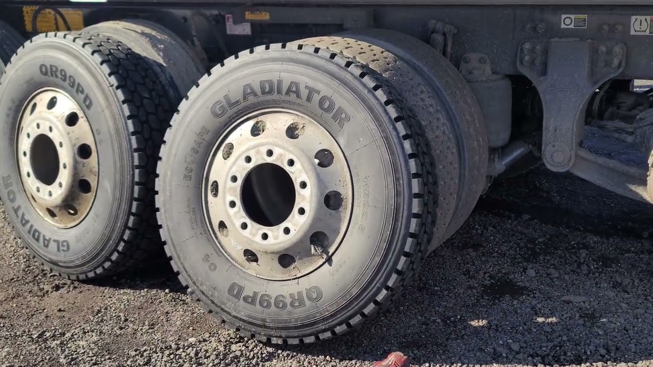 Kenworth quint back axle tire change.