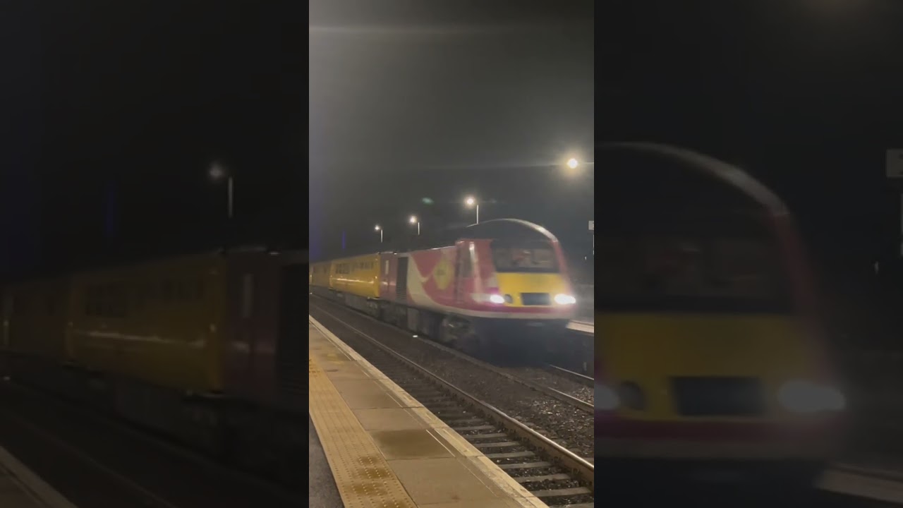 Network rail measurement train passes Carnoustie with the blue laser