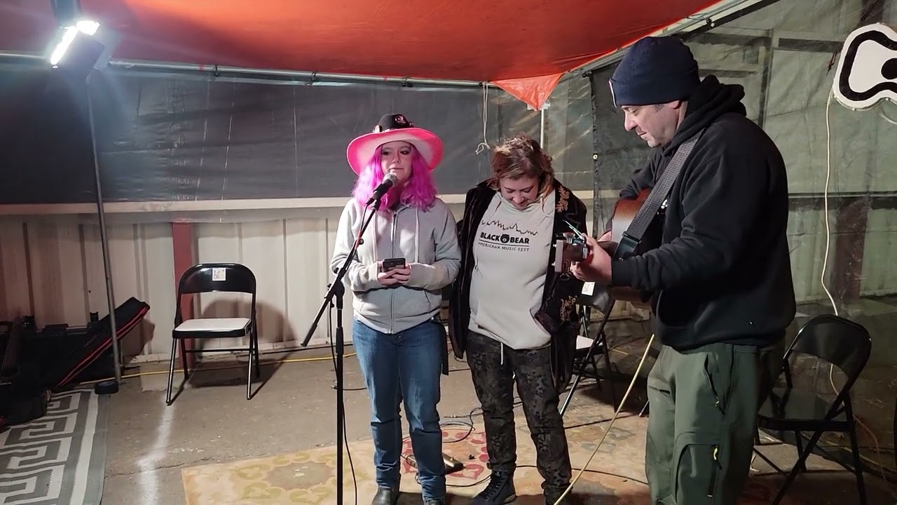 Hay, Sierra and Ian perform at the Big Orange Tarp at Black Bear