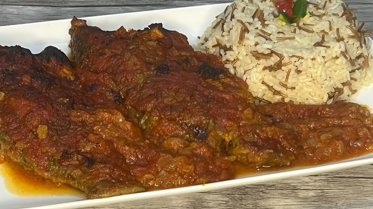 طريقه عمل صنيه السمك الشبار (البلطي) بالطماطم بطعم لذيذ