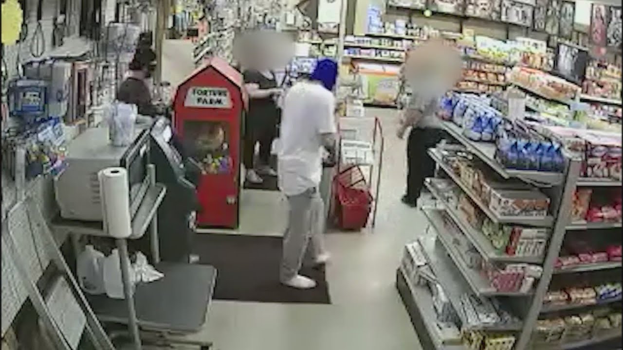 Video shows armed burglary, shooting at downtown convenience store