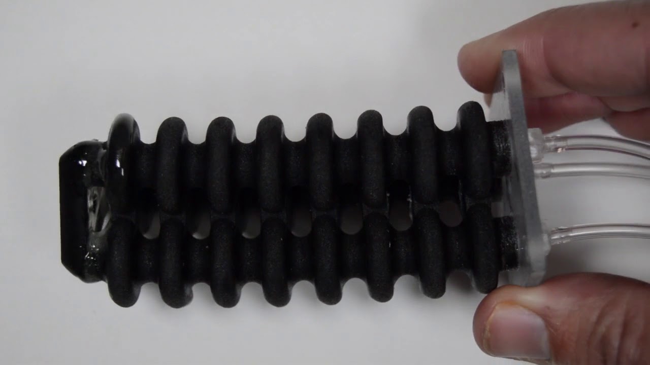 Differential Pressure Control of 3D Printed Soft Fluidic Actuators