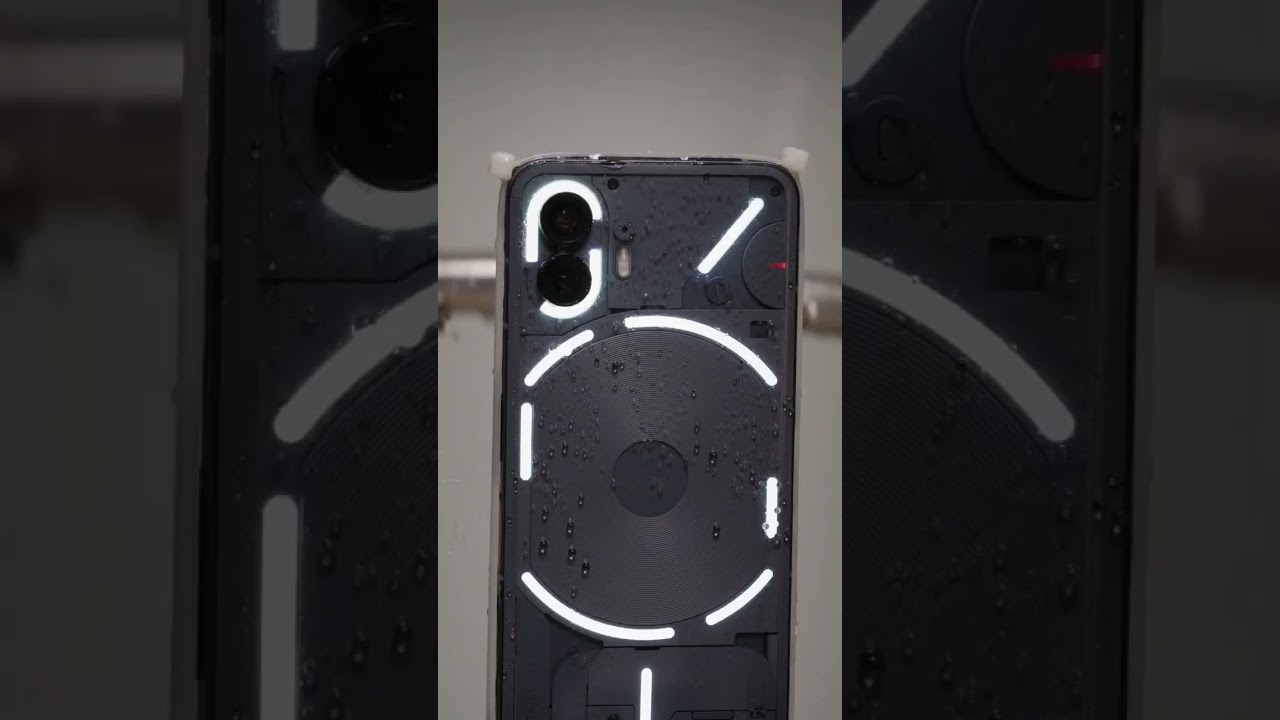 Phone (2) has IP54 water resistance, tested by spraying water at 0.84 L per minute for 10 minutes.