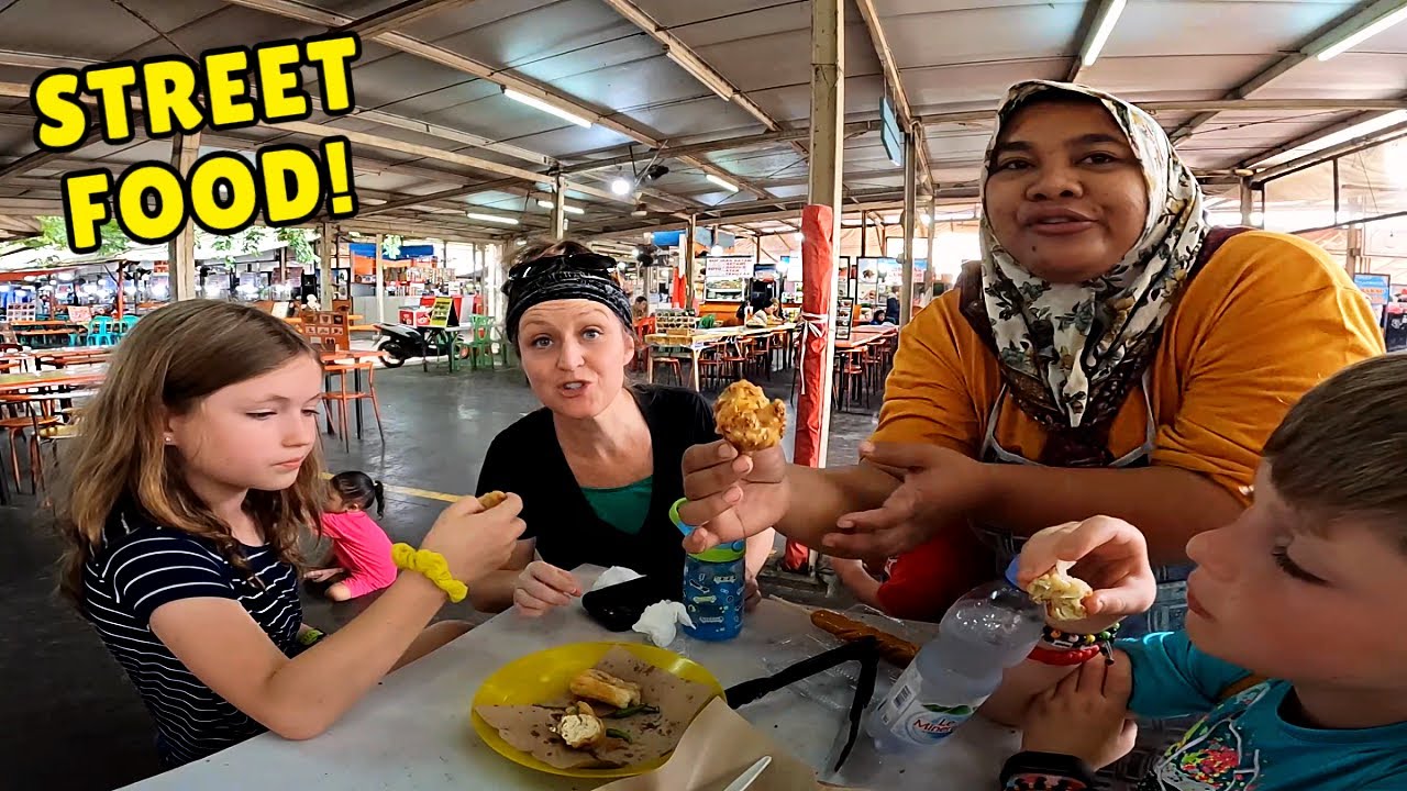 AMERICANS try INDONESIAN STREET FOOD at the NATIONAL MONUMENT and find MYSTERIOUS TJANANG ICE CREAM