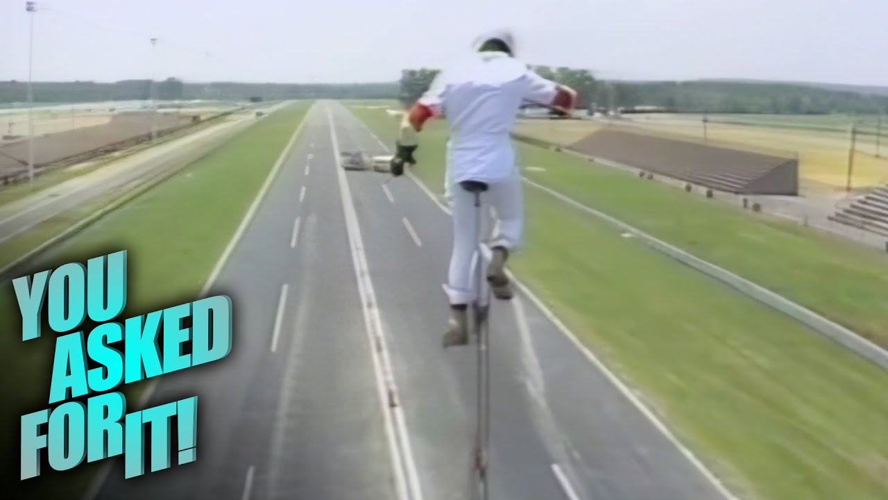 Man Rides The World's Tallest Unicycle - 
