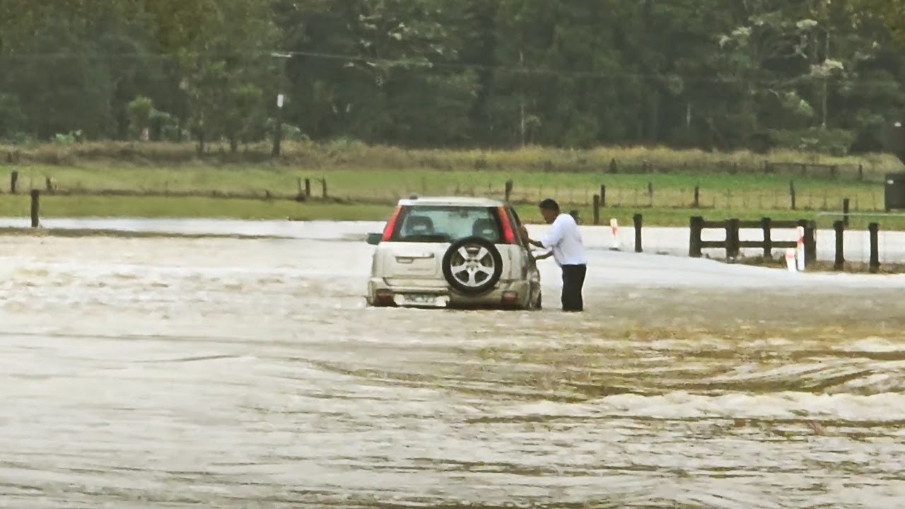 Cars Stranded in Cyclone Tam Floodwaters