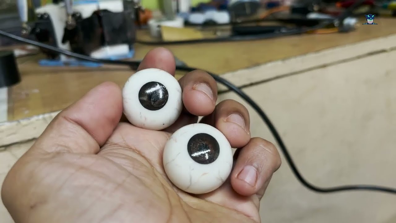 glossy robot eyes on simple process