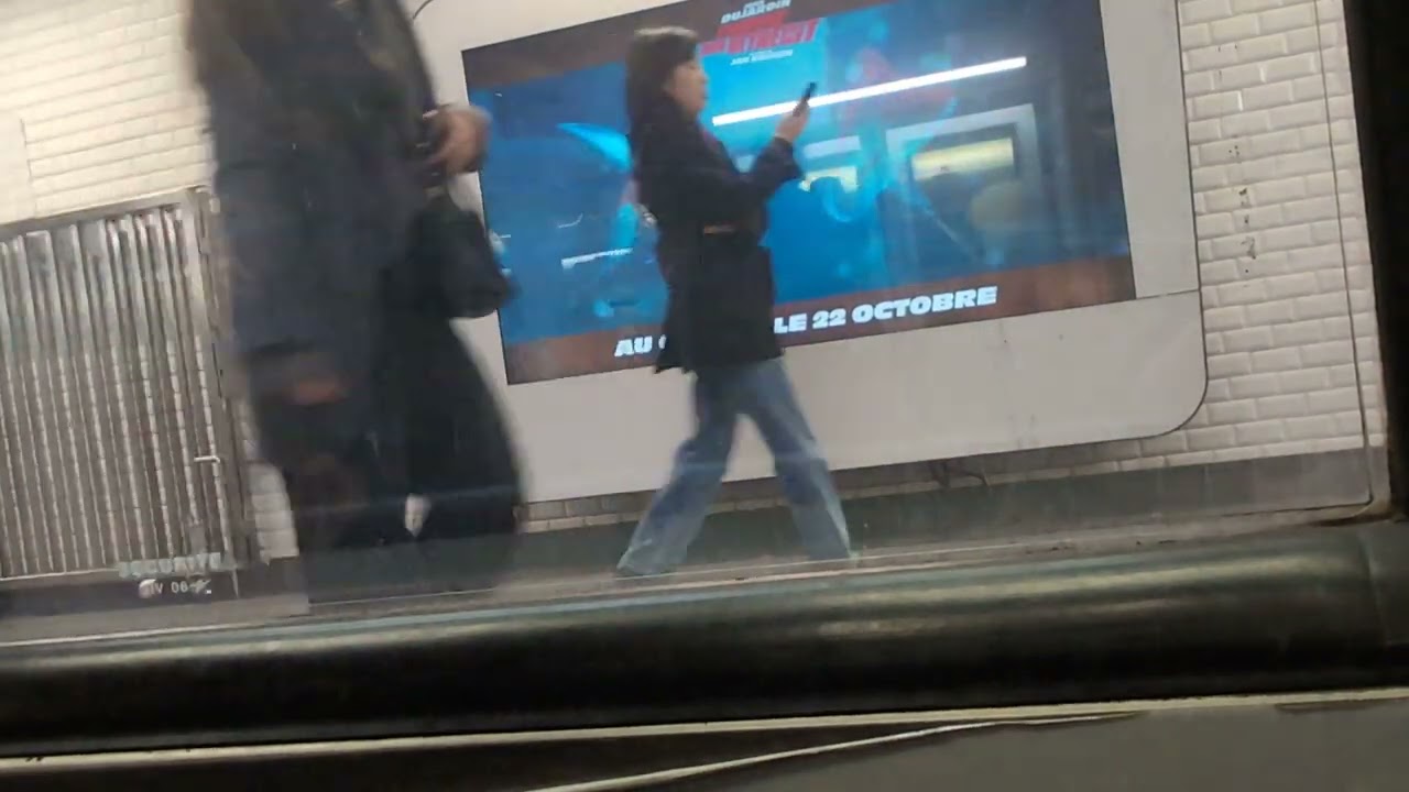 Moments in the Paris subway, Metro station Strasbourg-Saint-Denis to Gare de l'Est & Gare du Nord.