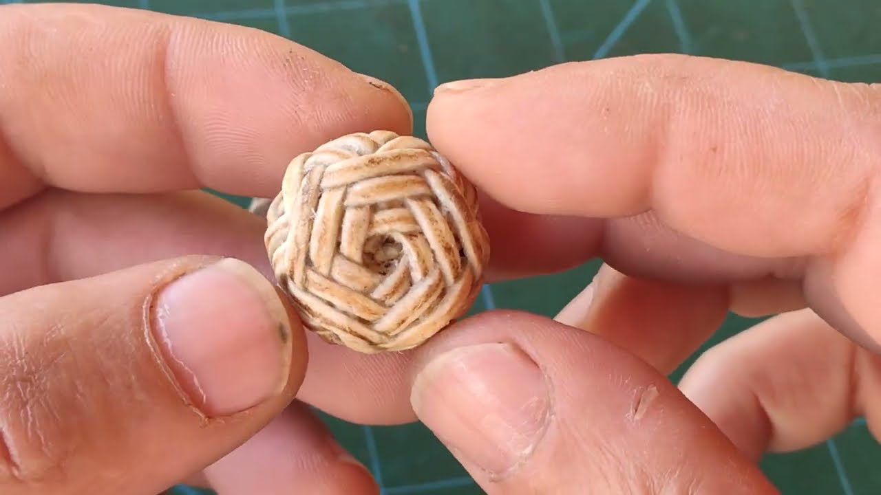 Botão pluma duplo.