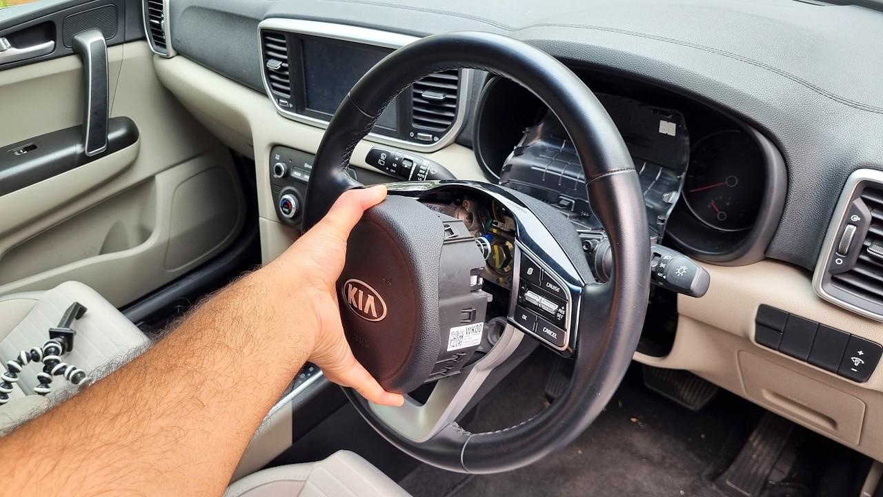 How to remove driver airbag module in Kia Sportage