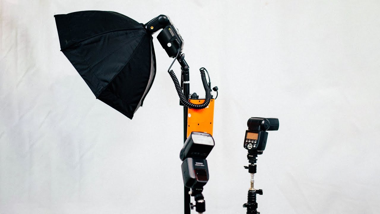 Best Cheap Portable Camera Flash - Yongnuo 560 vs Godox AD360