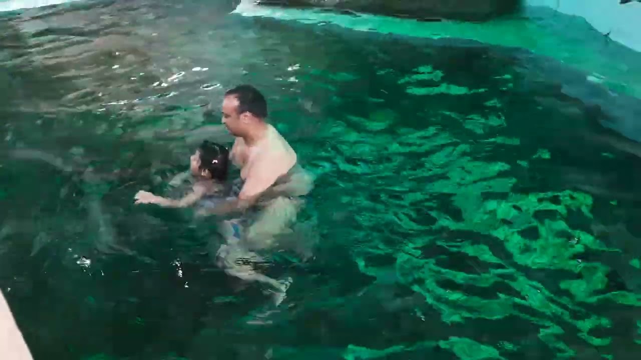 swimming in jakrem natural hot water spring(1)