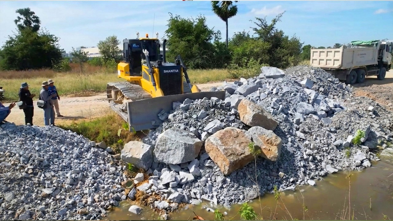 Incredible Pushing stones into the lake to release water By ozer SHANTUI C3Pro And DumpTruck 10Wheel