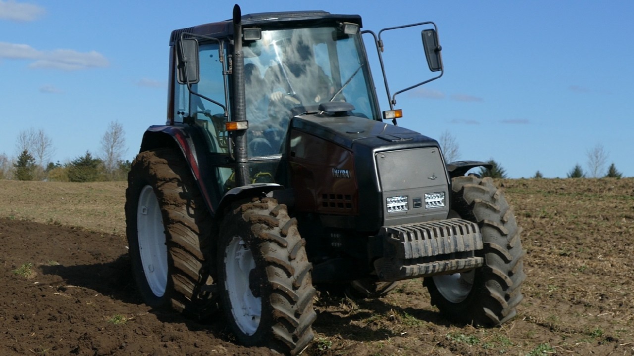 VALTRA Tractor With 4 Furrow Plow