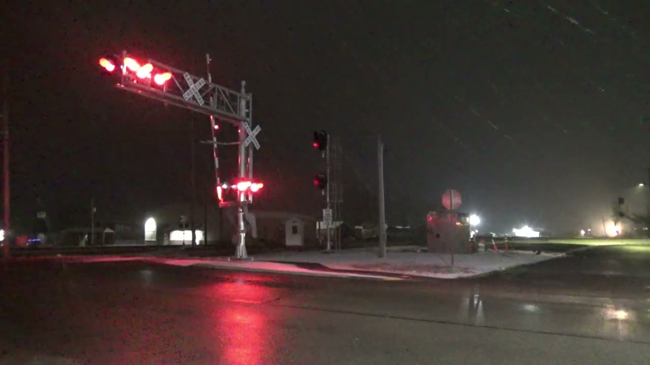INRD 7009 leading a nice mixed freight dashing through the snow, northbound. 12/1/25.